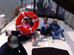 Bobbie hanging out with other PLPM staff member on Dr. Starr's sailboat.  (photo credit: T. Vann)